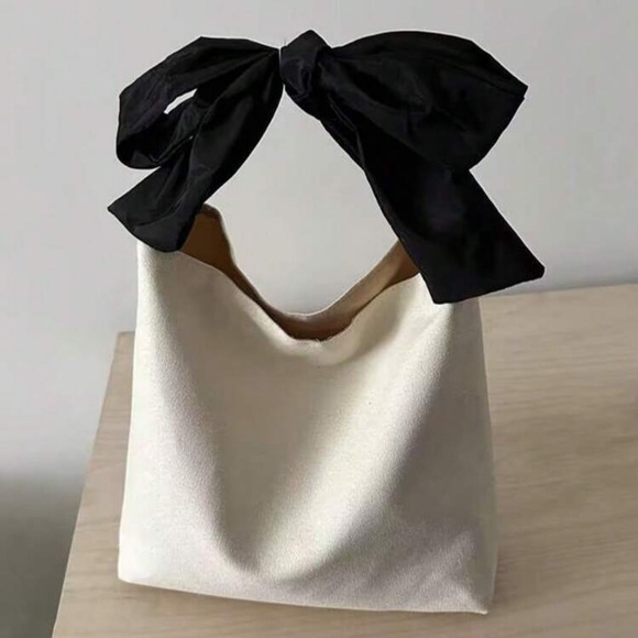Handbags - Chic Cream Canvas Tote with Black Bow Handle